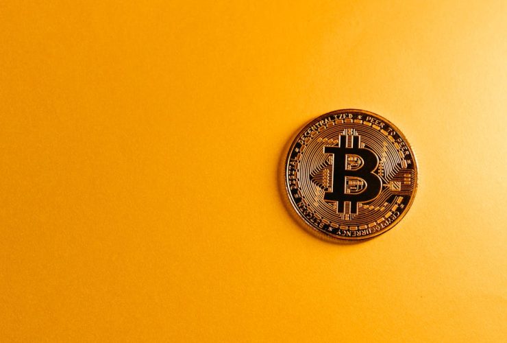 Bitcoin on Yellow Background