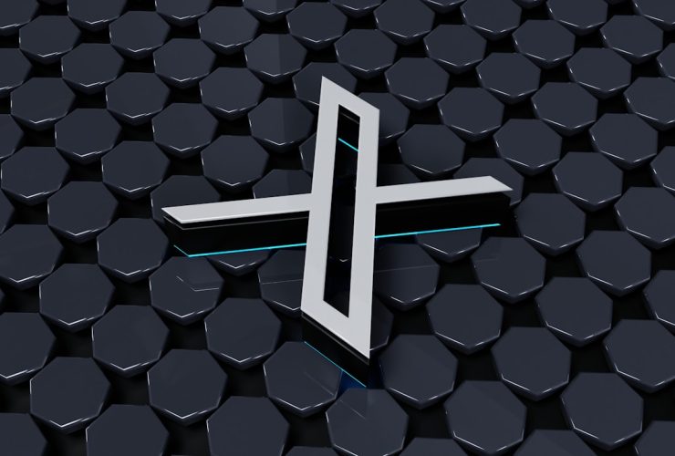 a white cross on a black background of hexagonal hexagons