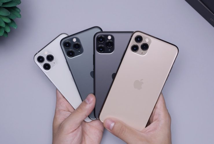 two space gray and two silver iPhone 11's