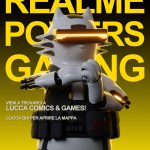 Grafica realme per Lucca Comics & Games 2026 con mascotte e loghi dei partner